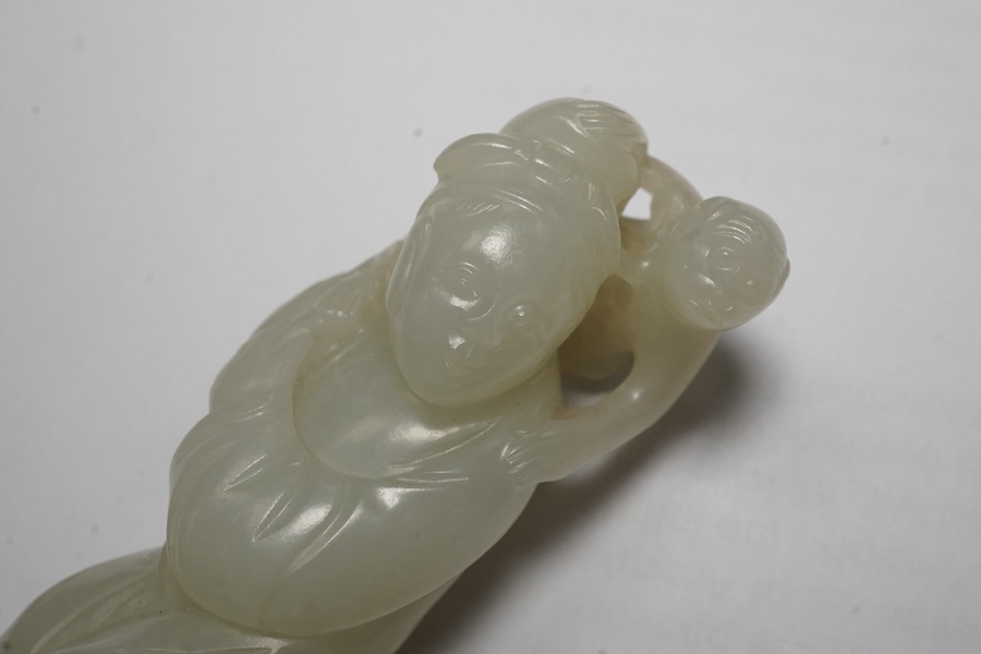 A Chinese white jade figure of a monkey trainer, 18th century